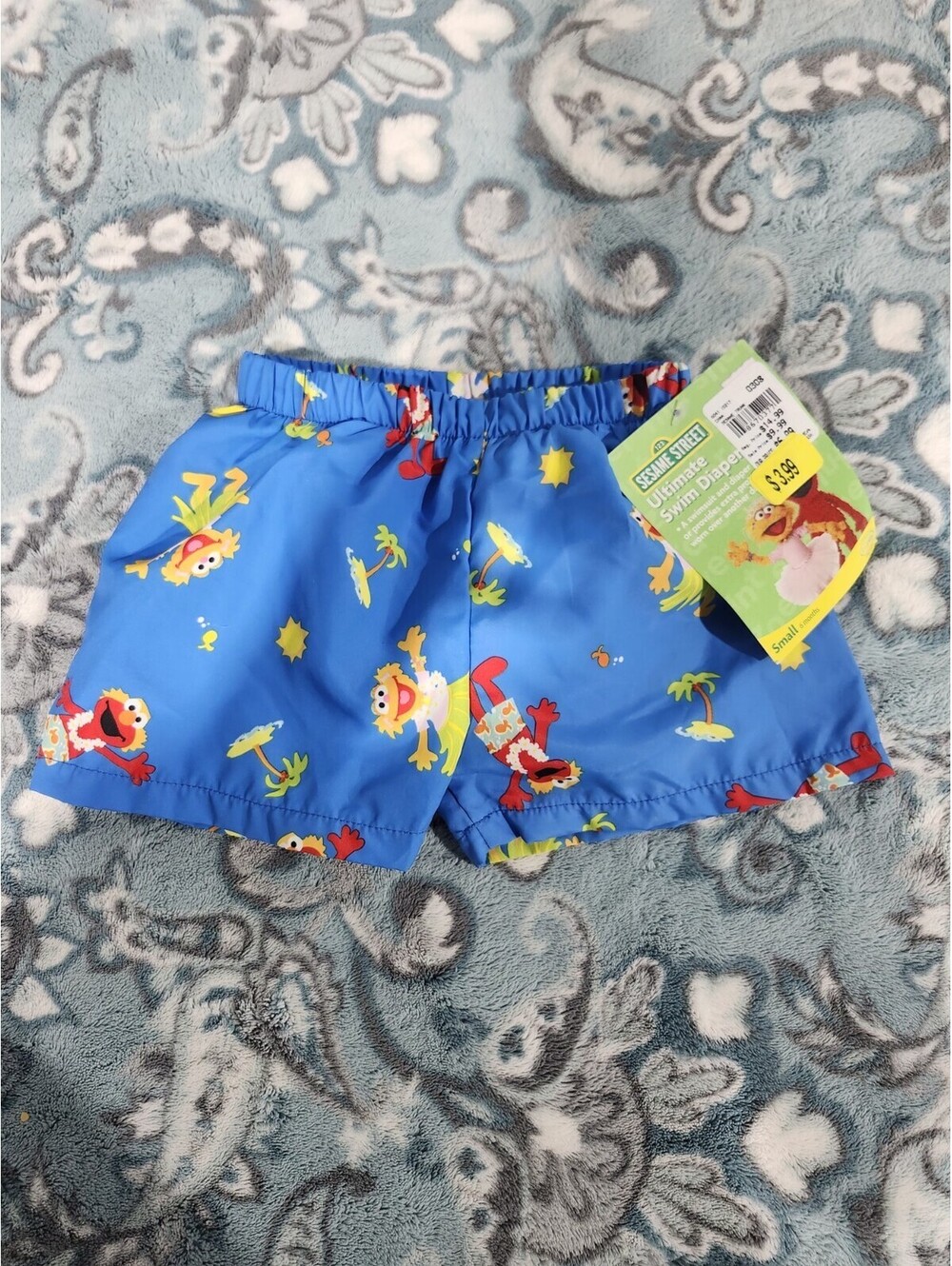 Sesame Street toddler boy's swim diaper is a vibrant Blue